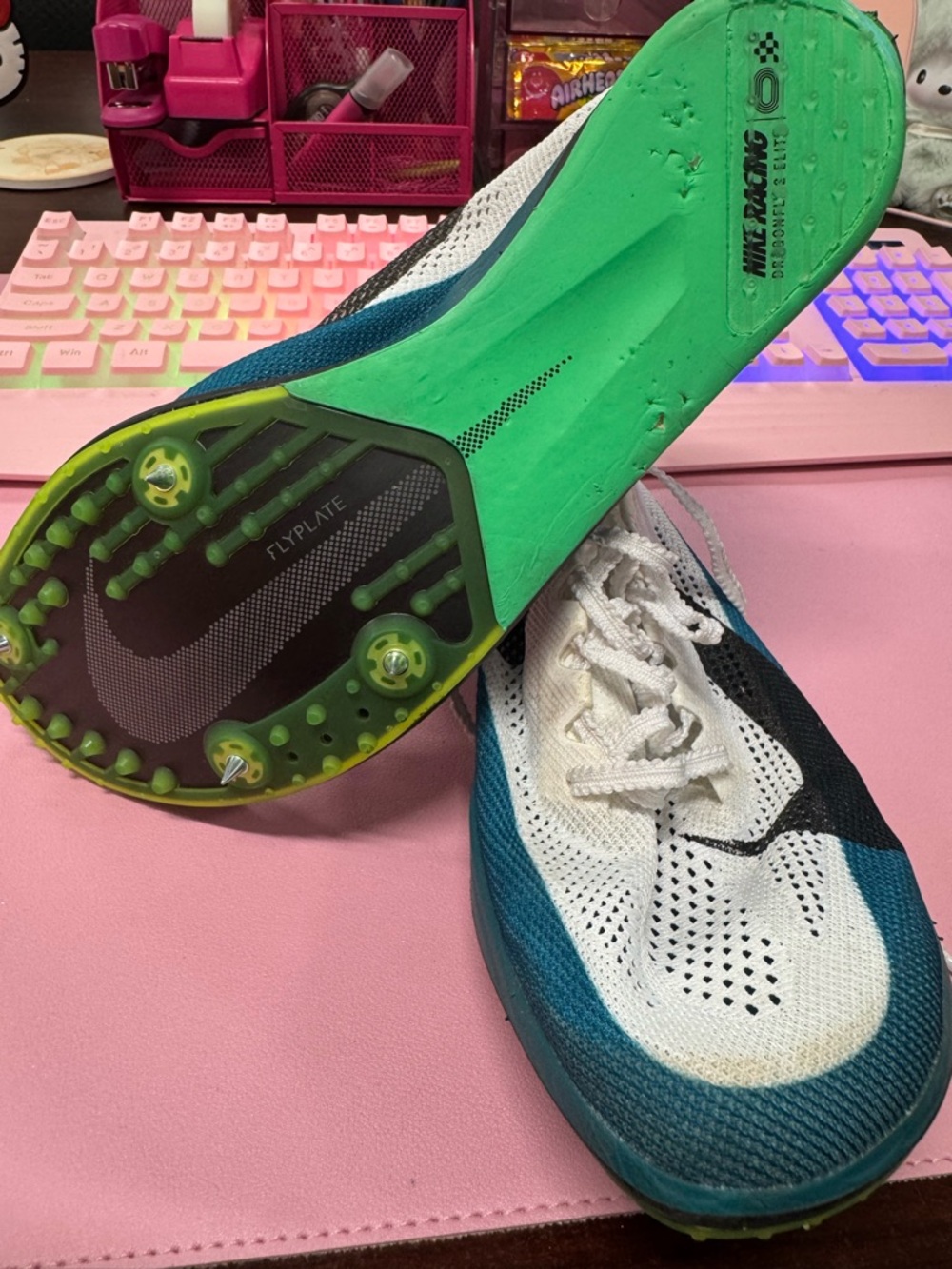 Nike Dragonfly 2 Elite. White, Teal & Black Lightweight track and field shoes.